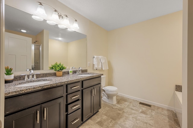 full bathroom featuring an enclosed shower, a sink, visible vents, and baseboards