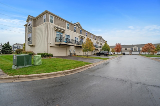 view of road featuring curbs and a residential view