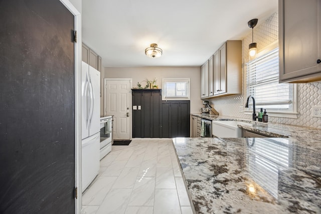 kitchen featuring marble finish floor, light stone counters, white appliances, and decorative backsplash