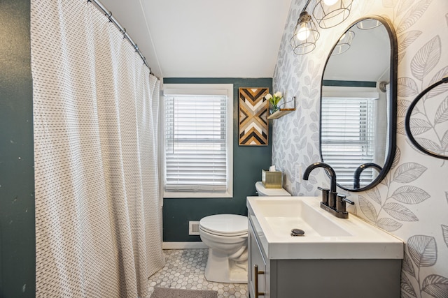 full bathroom featuring wallpapered walls, baseboards, toilet, tile patterned floors, and vanity