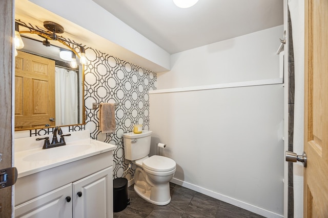 full bathroom featuring wallpapered walls, vanity, toilet, and baseboards