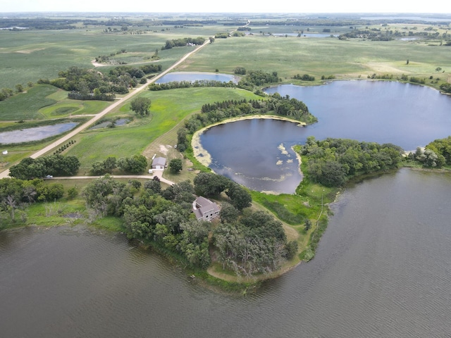 drone / aerial view with a rural view and a water view