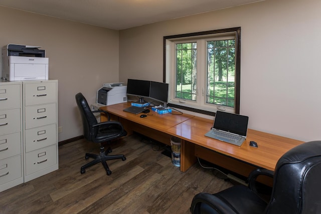 home office featuring baseboards and dark wood-type flooring