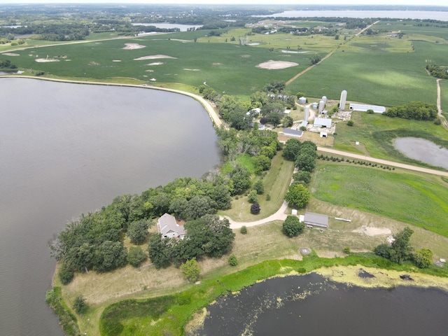 birds eye view of property featuring a rural view and a water view