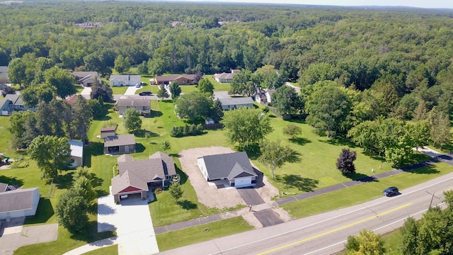 bird's eye view with a forest view and a residential view