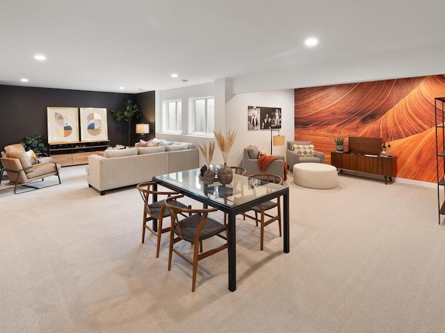 dining area featuring recessed lighting and light carpet