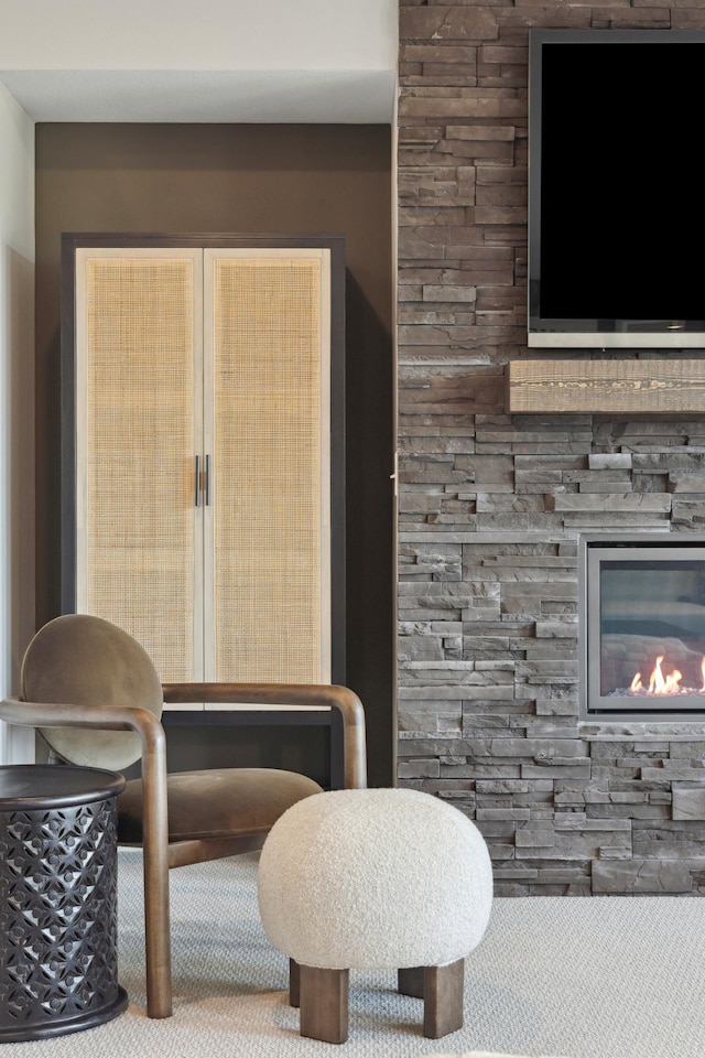 dining space featuring a fireplace