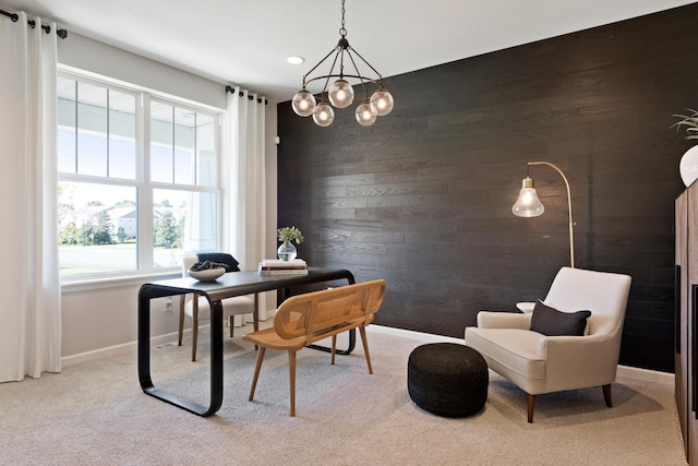 carpeted office featuring an accent wall, recessed lighting, wooden walls, and baseboards