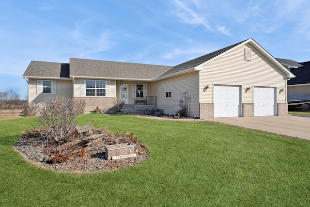 ranch-style home featuring a garage, a front yard, concrete driveway, and brick siding