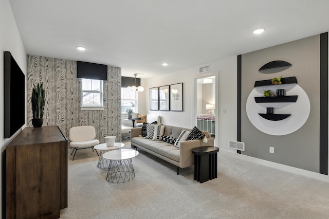 living room with baseboards, carpet, visible vents, and recessed lighting