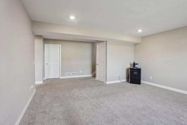 7295 Parson Ct NE, Otsego, MN 55330 - interior space featuring visible vents, baseboards, recessed lighting, and carpet floors