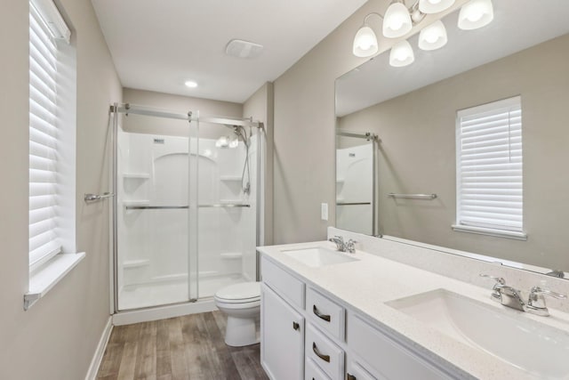 7295 Parson Ct NE, Otsego, MN 55330 - full bath with toilet, a shower stall, and a sink
