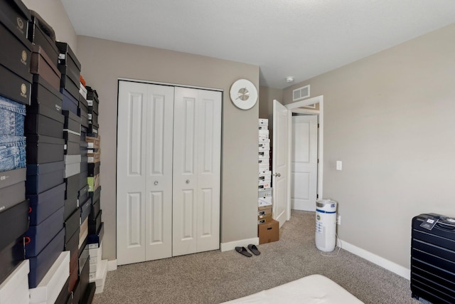 7295 Parson Ct NE, Otsego, MN 55330 - carpeted bedroom with visible vents, baseboards, and a closet