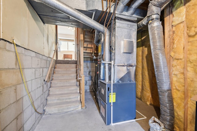 utility room with heating unit