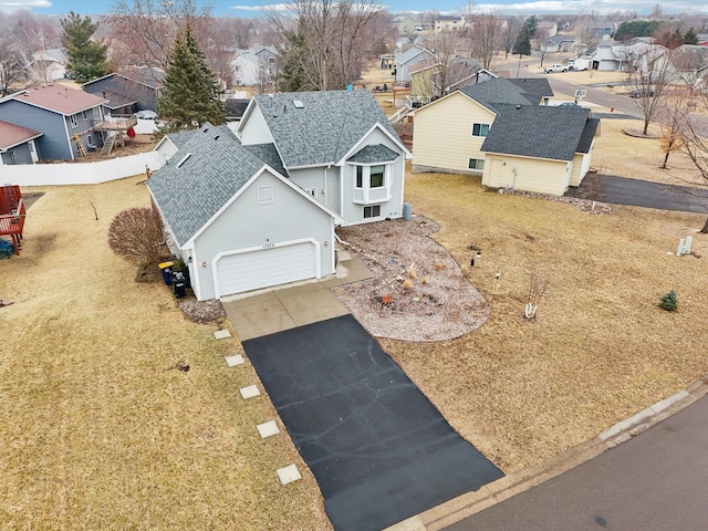 drone / aerial view with a residential view