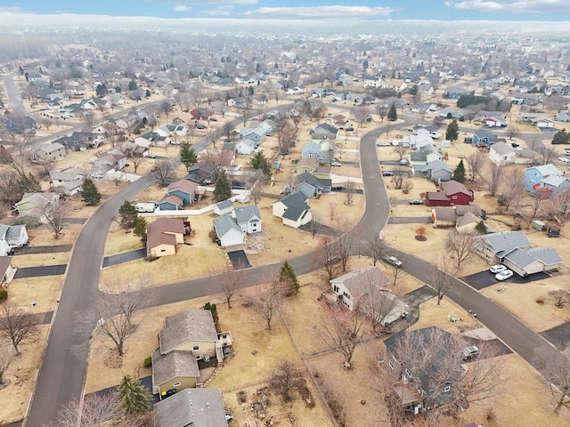 birds eye view of property with a residential view