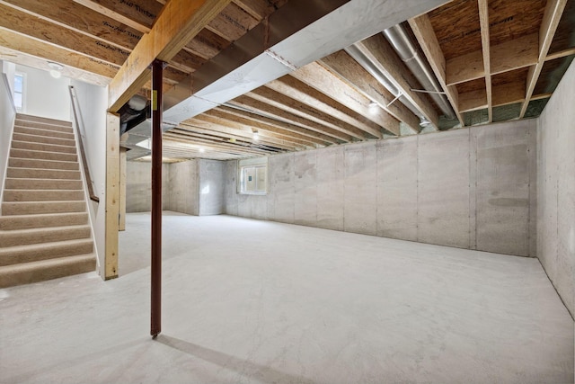 basement featuring stairs