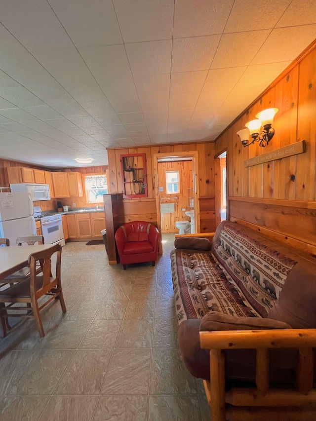 living room featuring wood walls