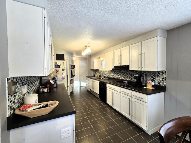 kitchen featuring dark countertops, black appliances, dark tile patterned floors, white cabinetry, and backsplash