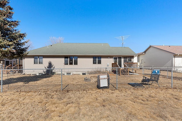 back of property with crawl space and a fenced backyard