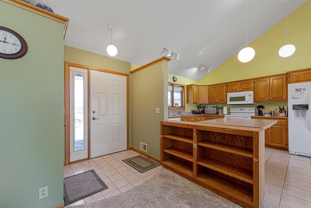 kitchen featuring light tile patterned floors, white appliances, visible vents, open shelves, and brown cabinetry