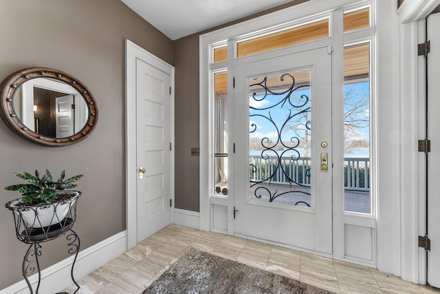 entrance foyer featuring baseboards