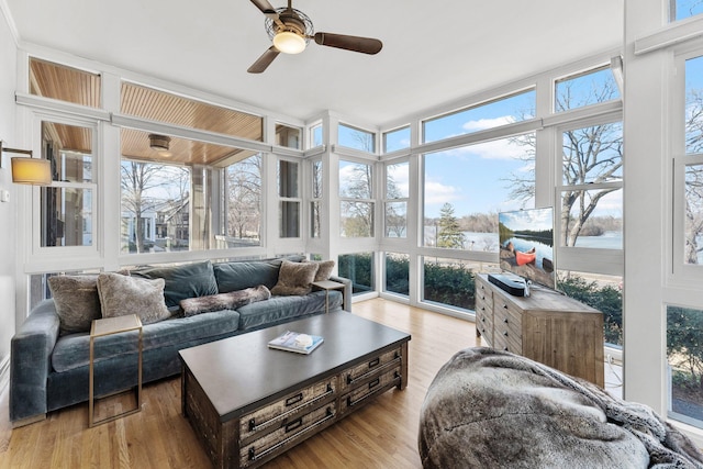 sunroom / solarium with ceiling fan