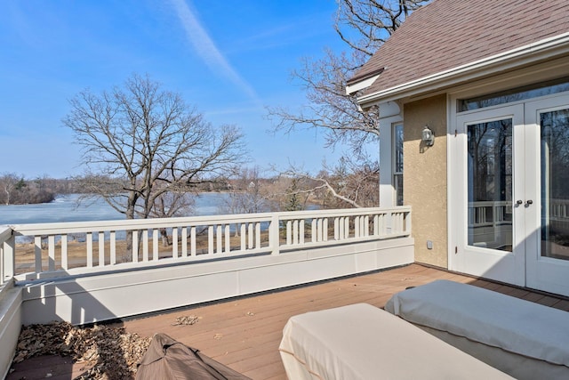 wooden terrace featuring french doors