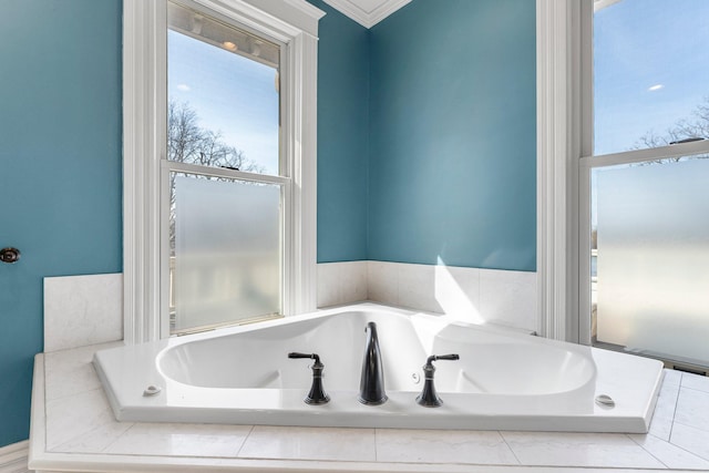 full bathroom featuring a bath and ornamental molding