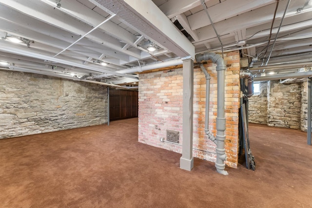 unfinished basement with carpet