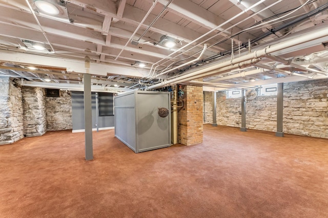 basement with light carpet