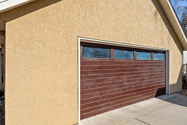 exterior details featuring stucco siding