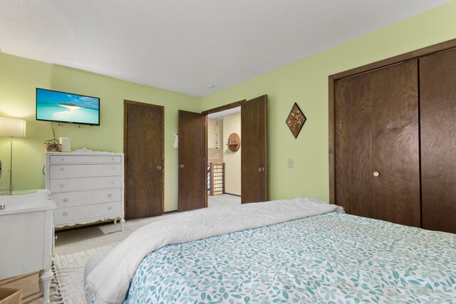 bedroom featuring a closet and carpet flooring