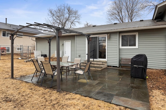 view of patio / terrace with fence, grilling area, a pergola, and outdoor dining space