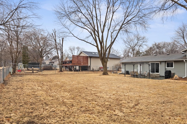 view of yard featuring a patio area and a fenced backyard