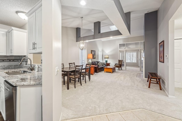 dining area featuring light colored carpet, visible vents, and light tile patterned floors