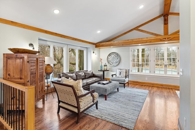 living area featuring baseboards, vaulted ceiling, wood finished floors, and recessed lighting