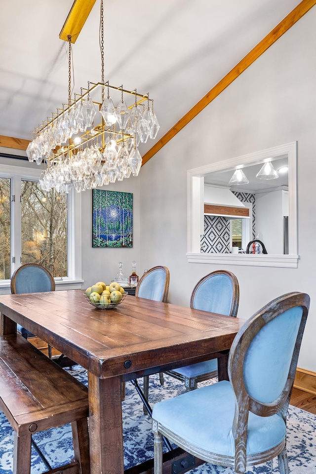 dining area with lofted ceiling