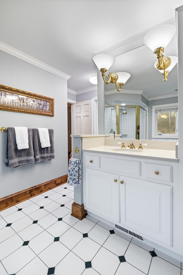 bathroom with vanity, visible vents, a shower stall, tile patterned floors, and crown molding