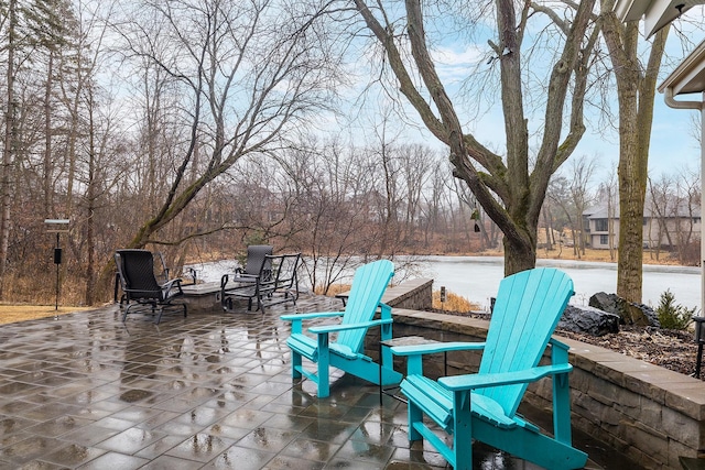 view of patio / terrace with a fire pit