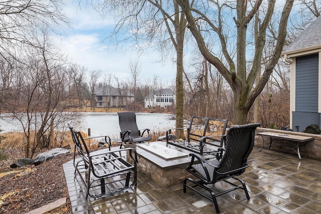 view of patio / terrace with a fire pit