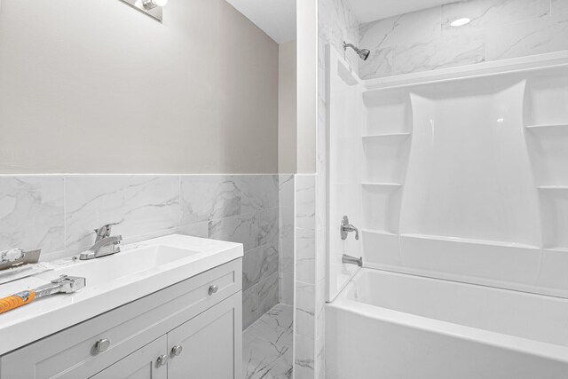 2310 Leona Dr, New Brighton, MN 55112 - bathroom featuring  shower combination and vanity