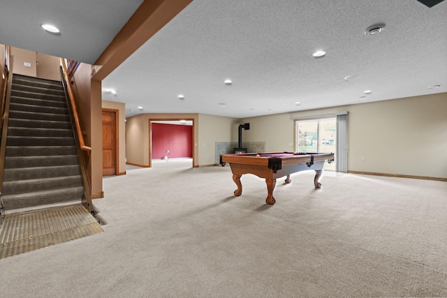 game room featuring carpet floors, billiards, a textured ceiling, and baseboards