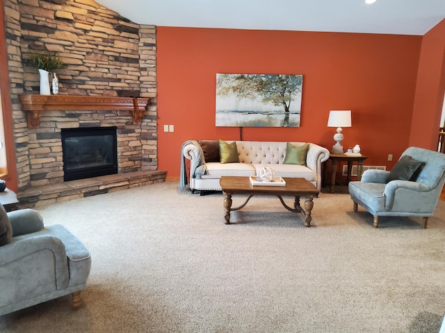 10590 Alamo St NE, Blaine, MN 55449 - carpeted living room featuring a stone fireplace