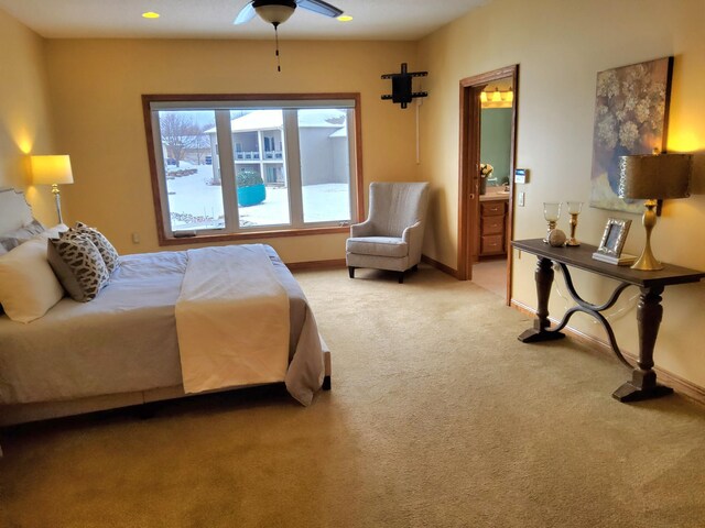 10590 Alamo St NE, Blaine, MN 55449 - bedroom featuring light colored carpet, baseboards, and connected bathroom