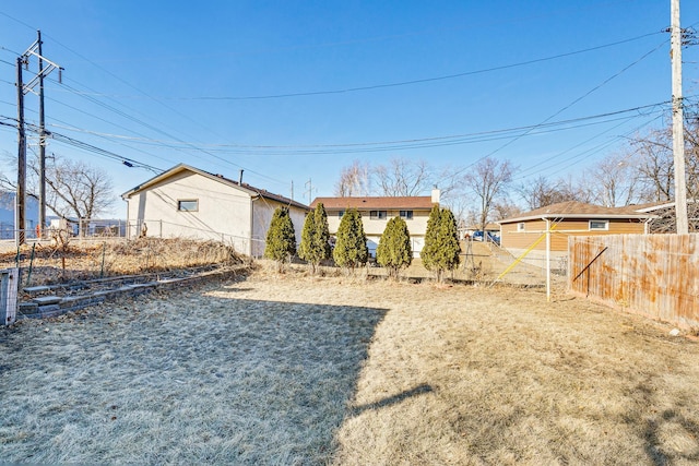 view of yard with fence