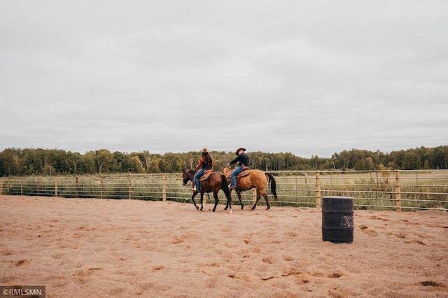 view of stable featuring a rural view