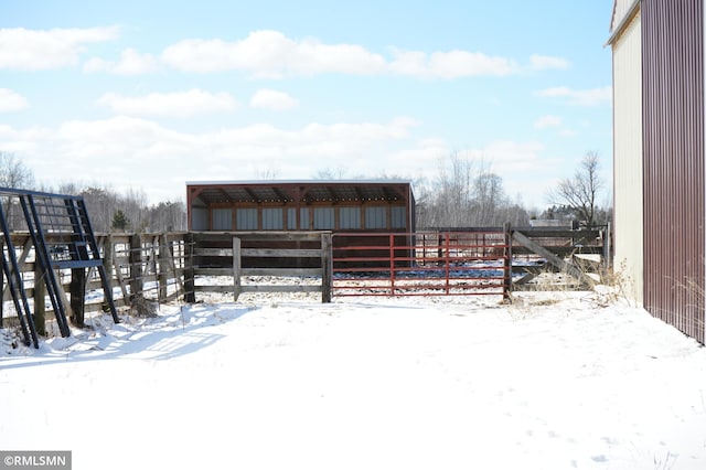 snowy yard with an outdoor structure