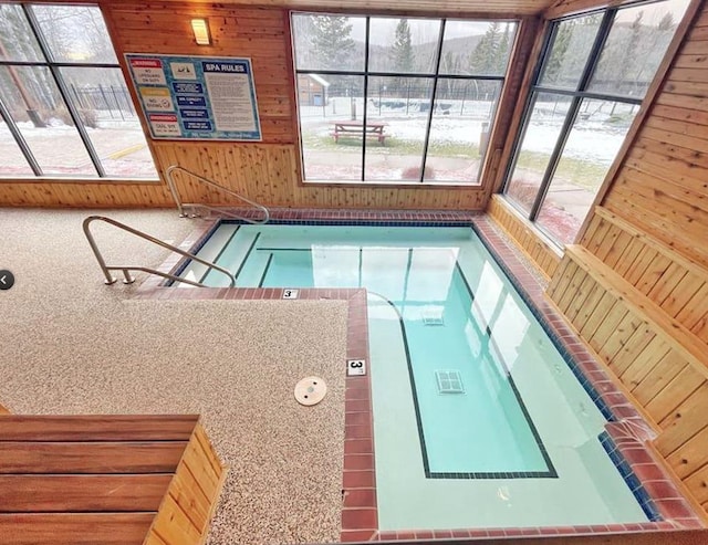 view of swimming pool featuring an indoor in ground hot tub and a swimming pool