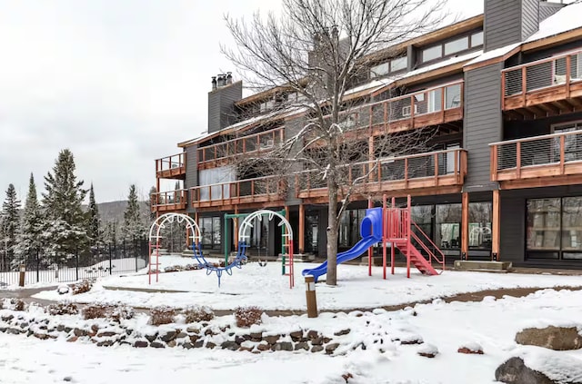 snow covered playground with playground community